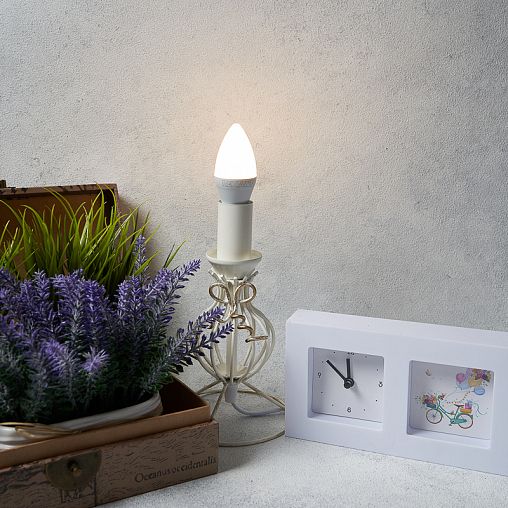 Лампа светодиодная Rexant Свеча, Е14, 9,5 Вт, 2700 К, теплый свет фото