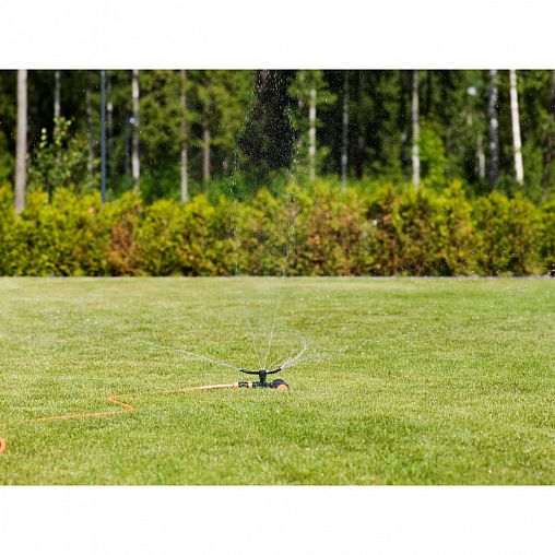 Дождеватель круговой Fiskars, на колесиках фото